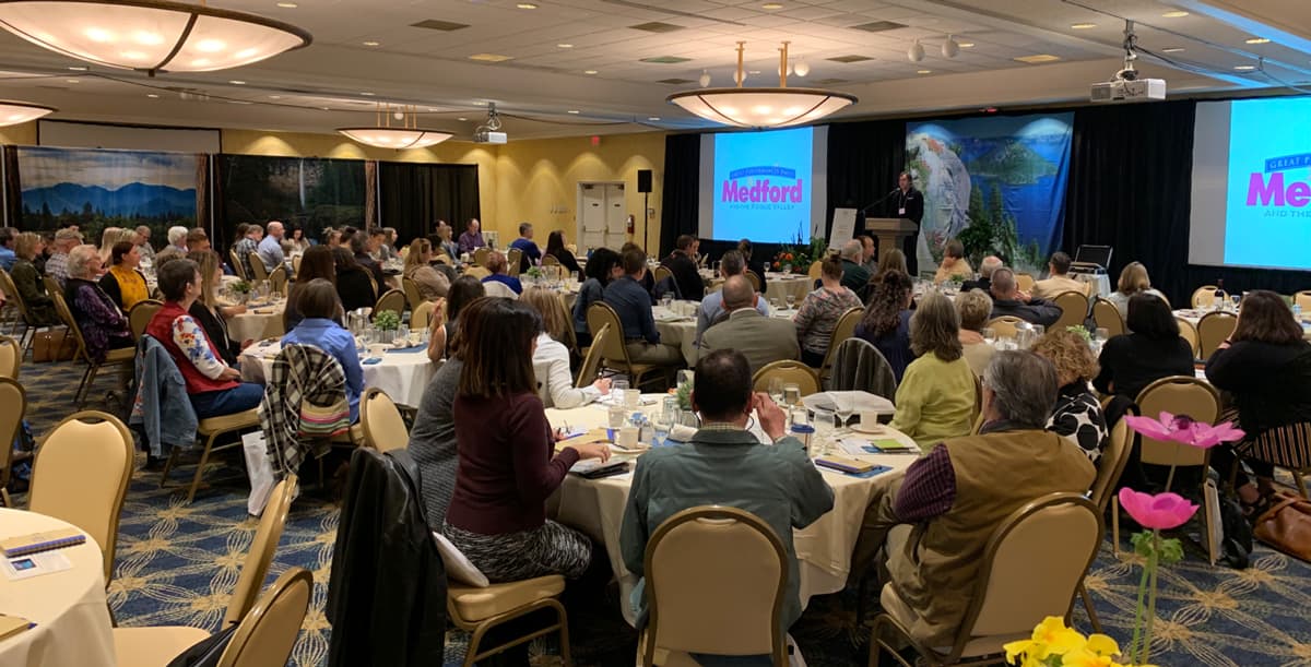 A room of people attending a Customer Service Training seminar in Medford